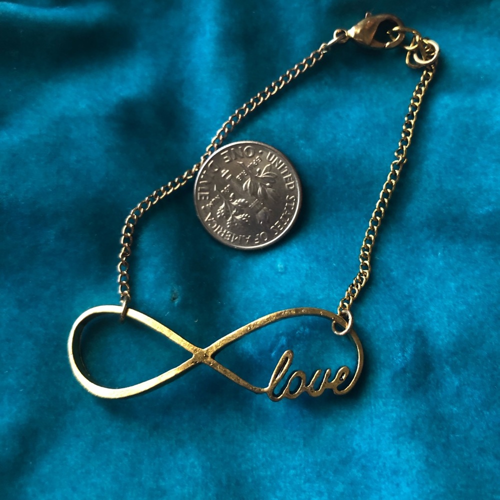 Love gold tone infinity bracelet